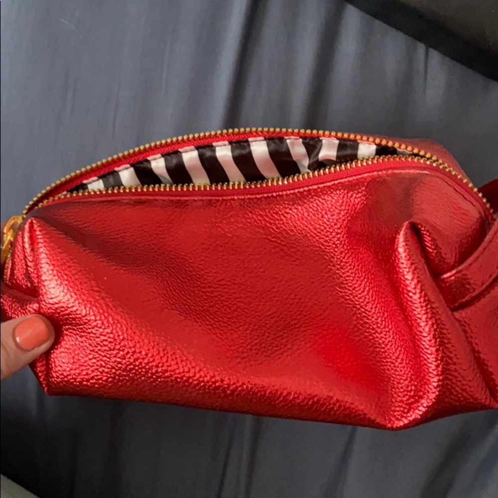 Red gently used bare minerals makeup bag